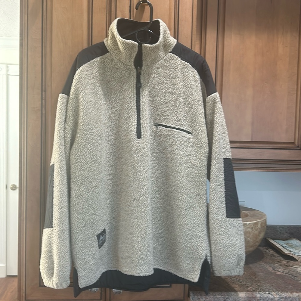 Black Ice Men’s ski jacket quarter zip. Inside tags cut out. size XL